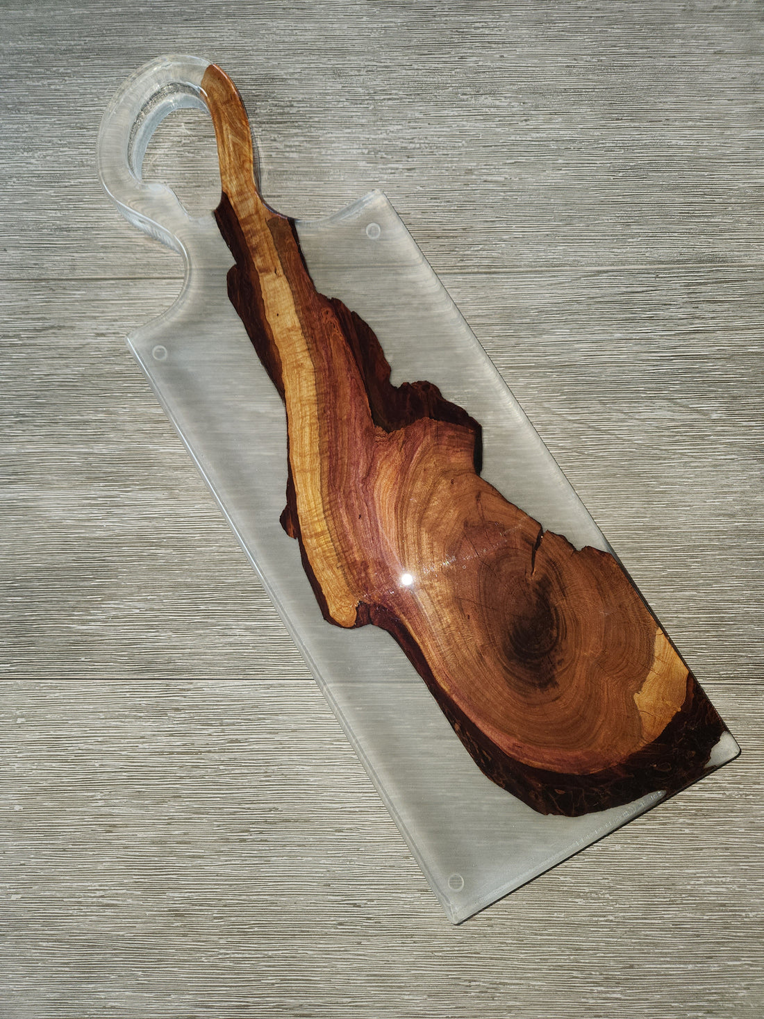 Custom plum wood and epoxy serving tray for your next party. Use this as a charcuterie board or a serving tray